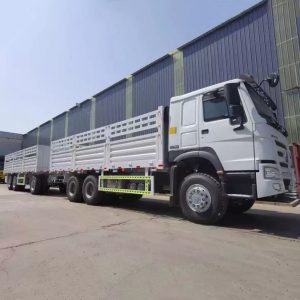 3 Axles Dolly Full Drawbar Drop Flatbed Side Wall Board Fence Turn Table Twist Lock Container CKD SKD Truck Trailer for Sale in Ethiopia (2)