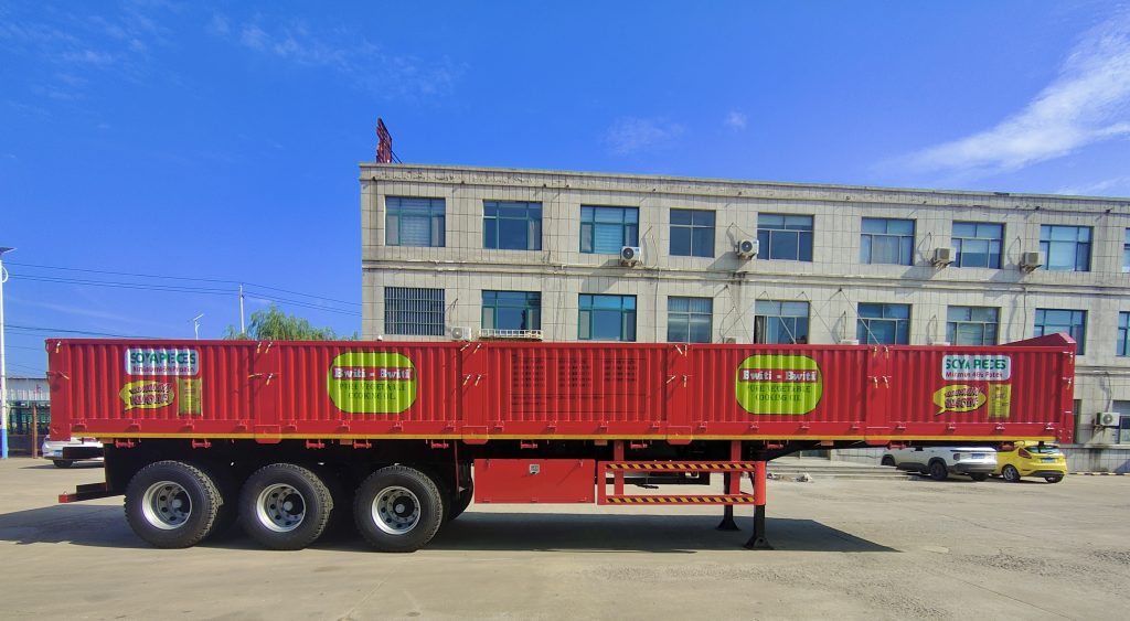 Tri Axle 60 Ton Sidewall Semi Trailer will export to Tanzania插图